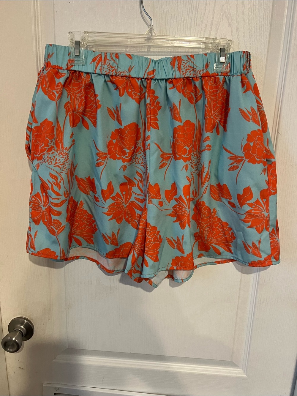 SHEIN Light Blue High-Waist Shorts with Orange Floral Print